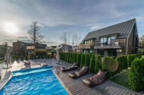 Vaivorykstes Namai with Heated Pool by Hostlovers